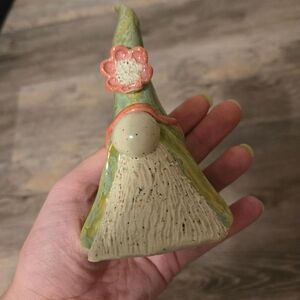 Small green gnome sculpture